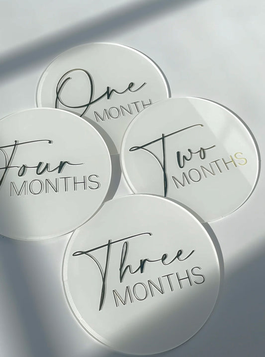 White monthly acrylic discs